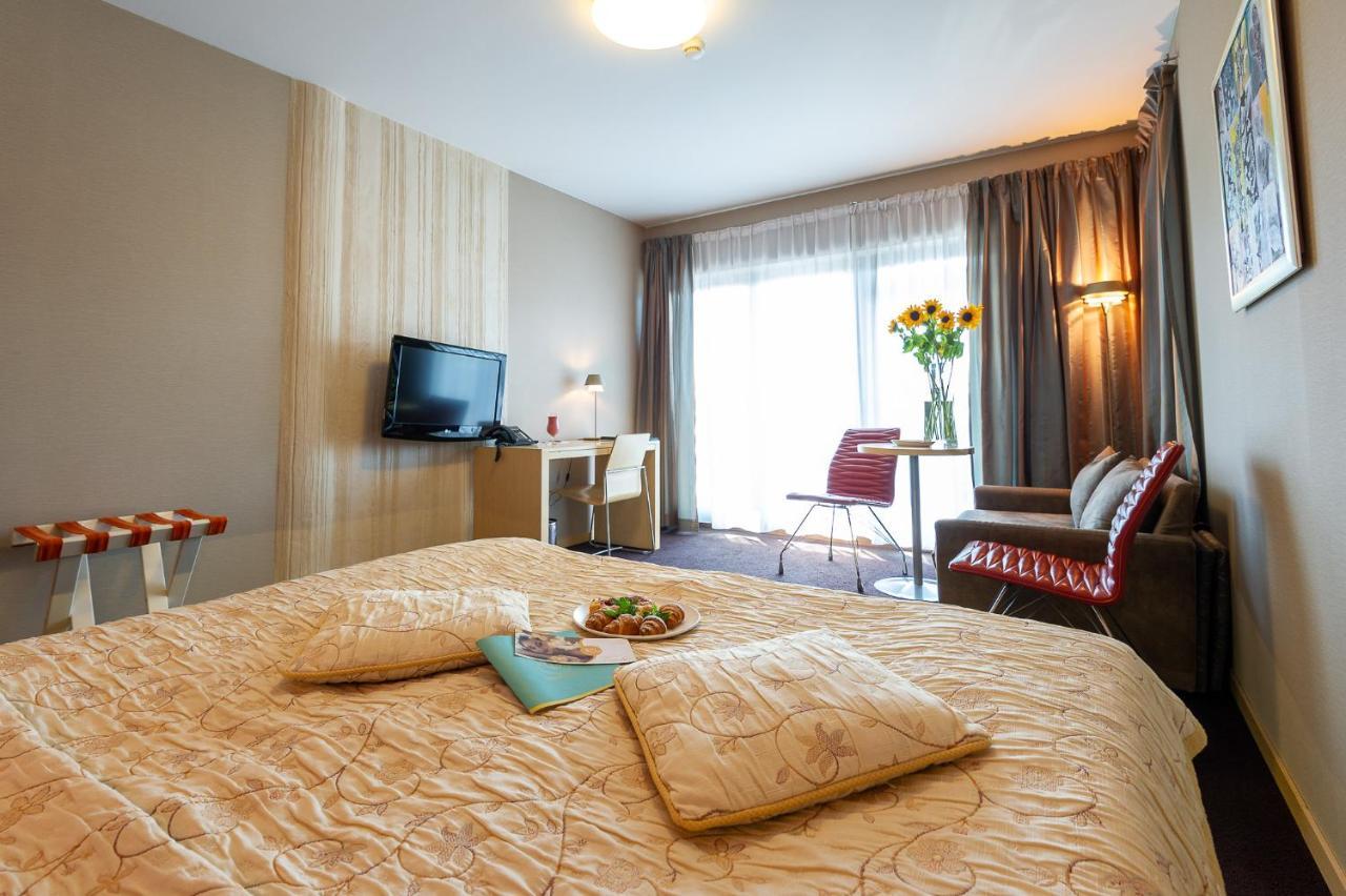 Niebieski Art Hotel & Spa Krakow Dış mekan fotoğraf A typical room at a hotel